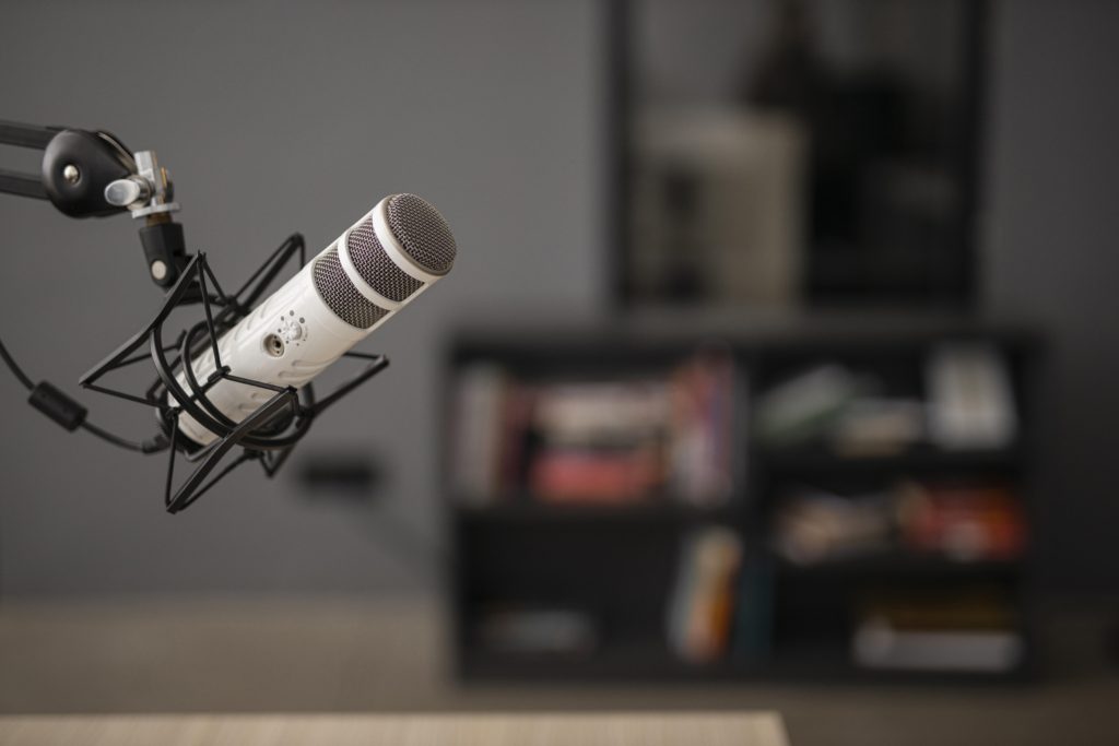 Image showing podcast microphone in a podcasting environment. 